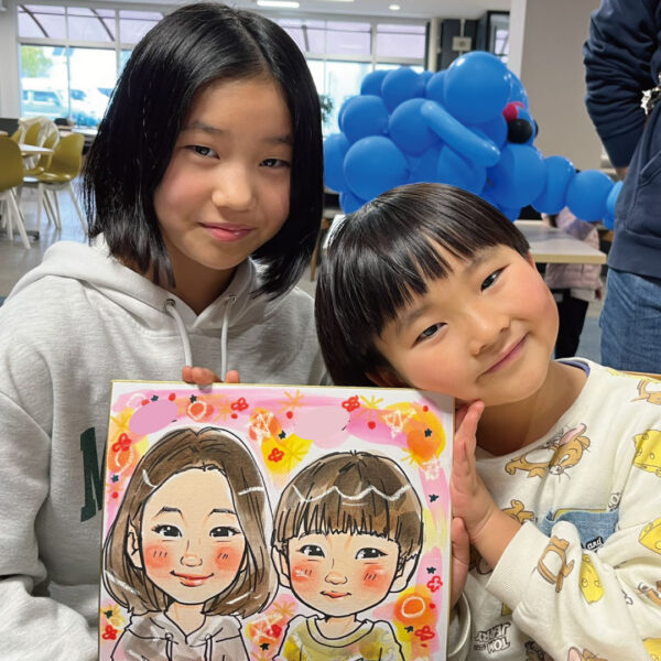 大阪の企業似顔絵イベントで似顔絵を制作